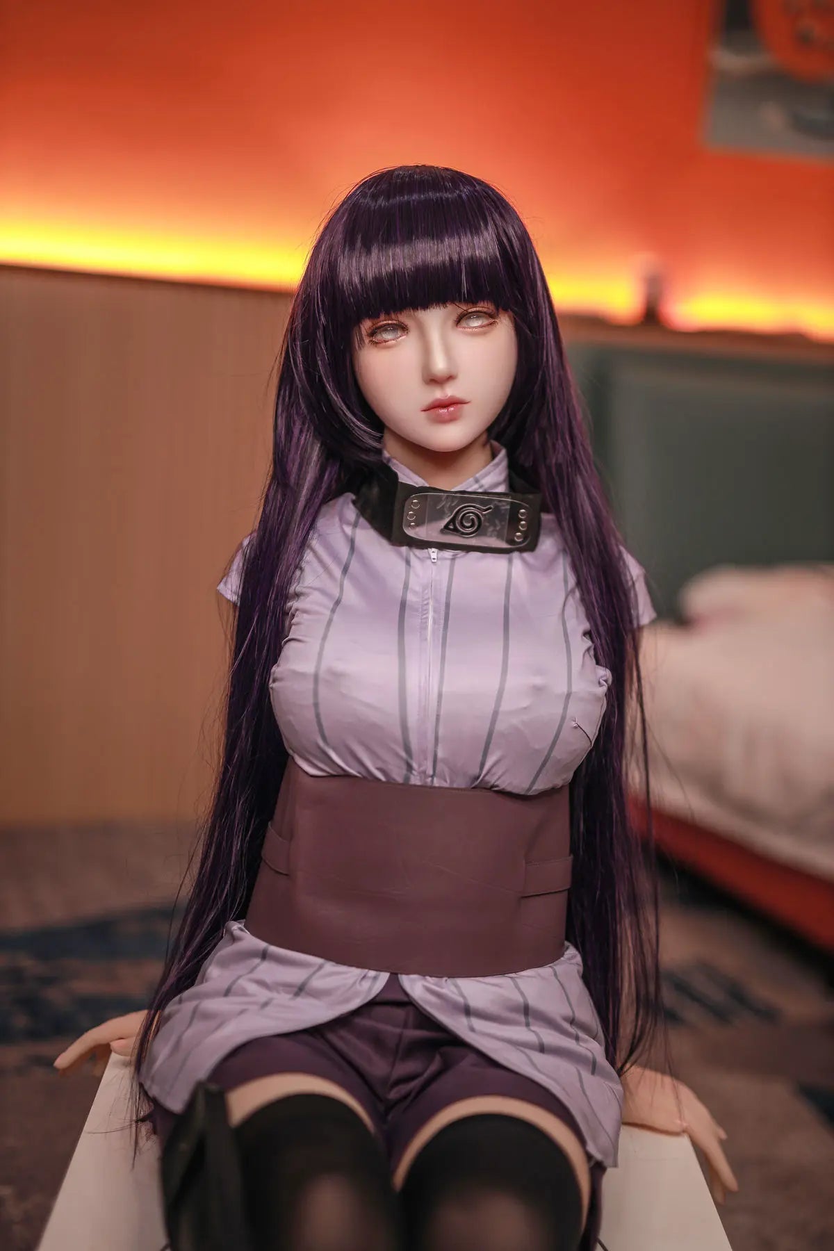 Hinata, Naruto cosplay sex doll,  black straight hair, Leaf Village outfit, half body shot, pearl earring, sitting on a nightstand – anime cosplay sex doll by TopLoveDoll
