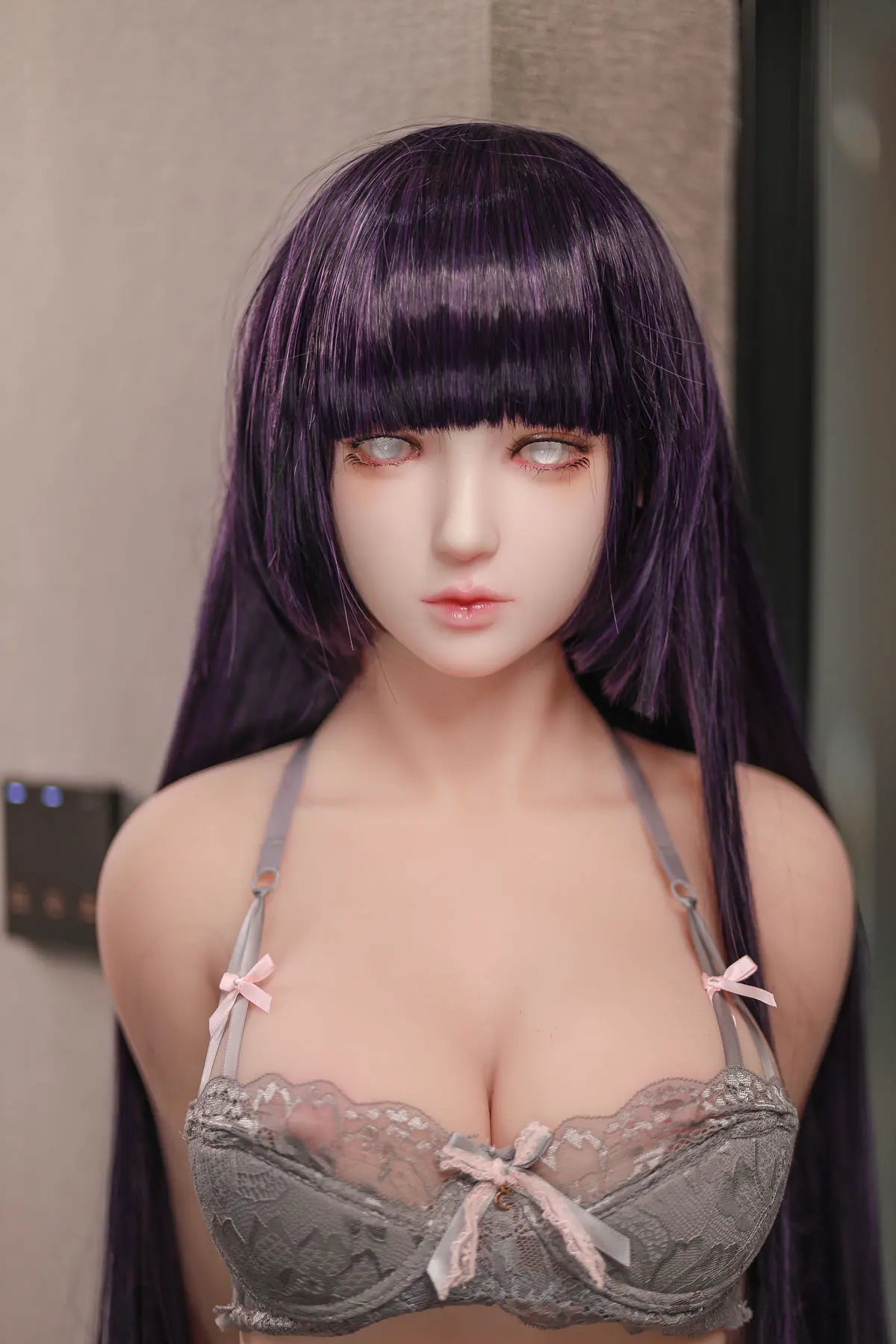 Hinata, Naruto cosplay sex doll,  black straight hair, Leaf Village outfit, chest level shot, pearl earring, leaning on a table, top unzipped and pulled down, revealing her bra and beautiful curves – anime cosplay sex doll by TopLoveDoll