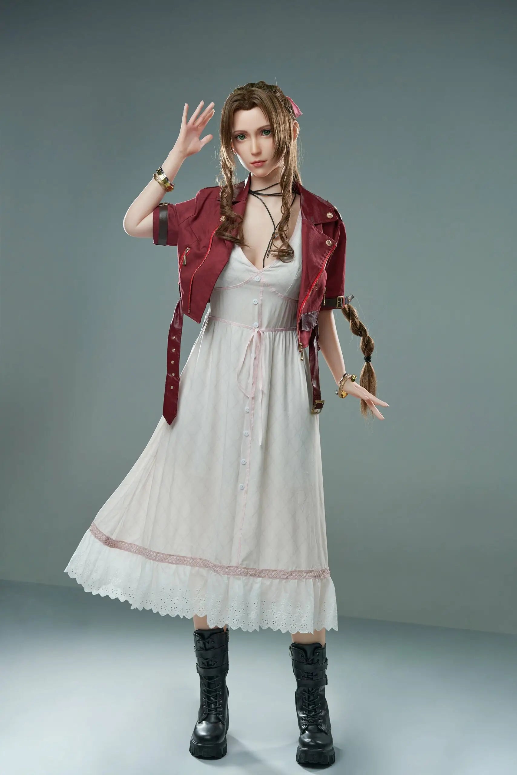 Seyo, brown wavy twin braids, pink hair bow, burgundy leather jacket, white deep-V slip dress, black leather mid-calf boots, green eyes, layered leather string choker, golden layered bracelet, looking at the camera like curious, grey studio background, standing, one hand raising up like proposing something – Tifa Lockhart cosplay sex doll by TopLoveDoll