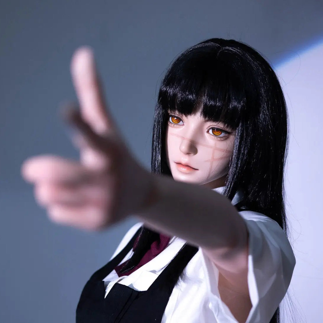 Alana, black straight long hair, white shirt black JK pinafore dress, crimson bow, white mask, scars on the face, white studio shooting scenario, a tear mold under the left eye, doing the hand gun gesture and targeting somewhere – Tomie Junji Ito inspired horror beauty anime sex doll by TopLoveDoll