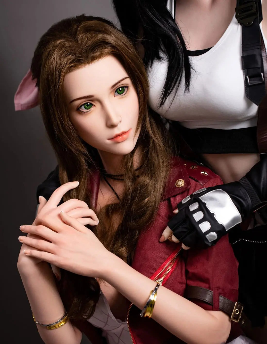 Hera, dark brown long curls hair, dark red suede jacket, white V-neck slip dress, pink bow, black choker, grey studio lighting background, sitting and in someones' arms – European bookish bombshell companion sex doll by TopLovedoll