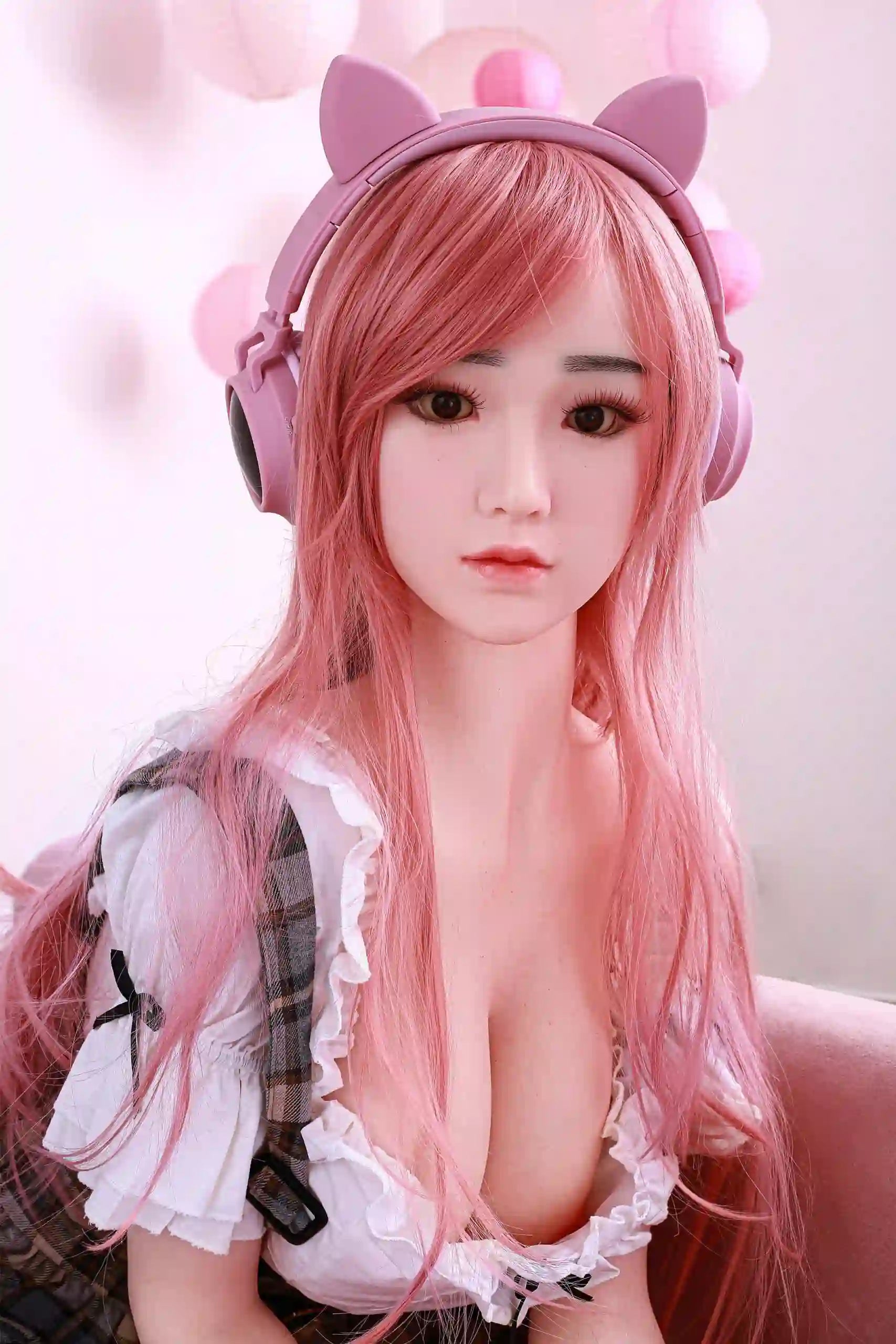 Alba, pink long curly hair, cat ears headphone, black strap plaid JK skirt, white lace low-neck cut top, pink sofa, petal backdrop anime esports gamer girl, bombshell figure, kneeling on the sofa, very naughty posture, face close-up ,very cute Korean style face design– anime companion sex doll by TopLoveDoll