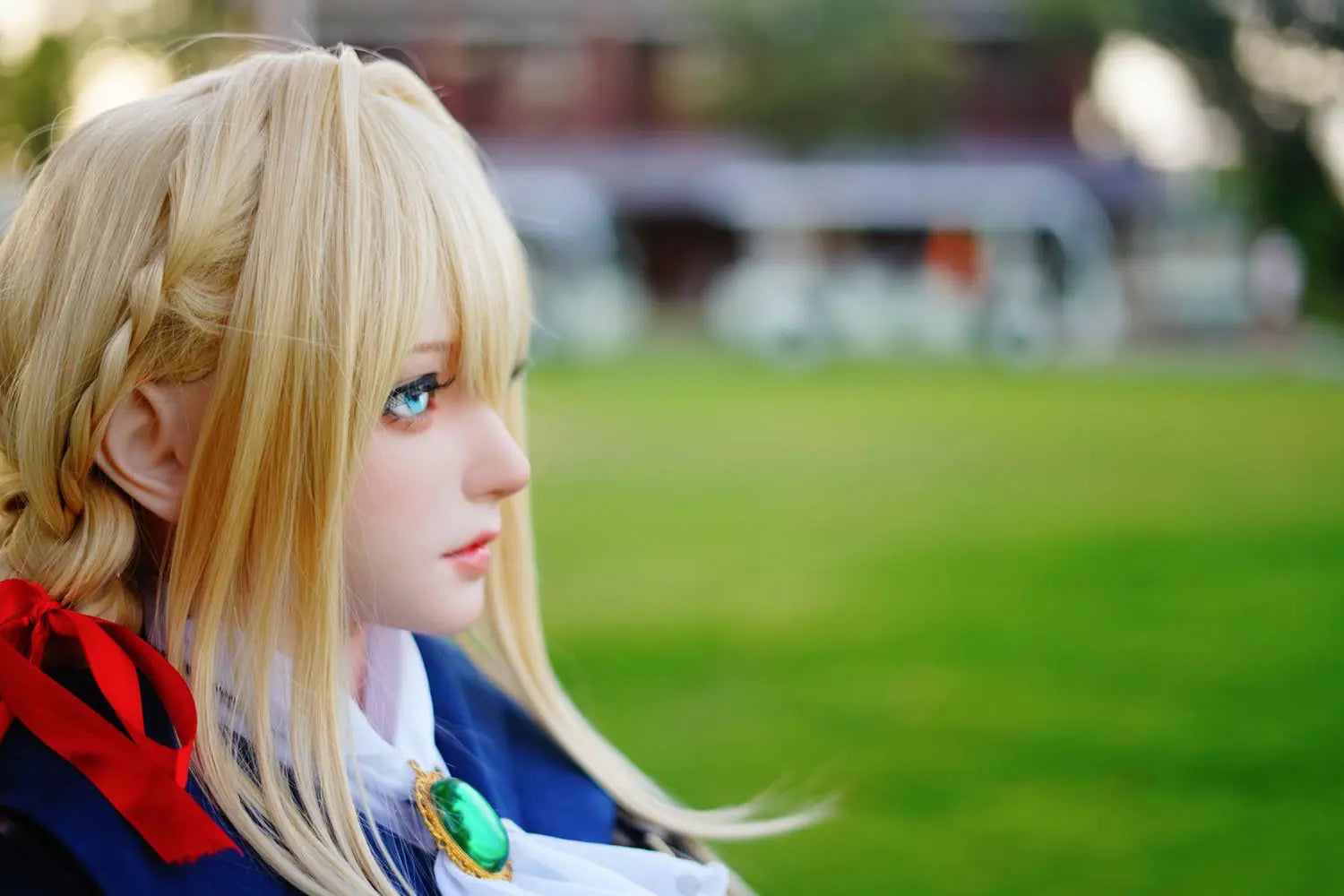 Aliana, golden straight long hair, blue eyes, navy Auto Memory Doll uniform, white apron, black leather boots, outdoor, standing, holding an envelop, brown gloves, holding a brown leather suitcase, eye-level shot, right side view, look away, doing the salute gesture, horizontal profile – Violet Evergarden cosplay anime sex doll by TopLoveDoll
