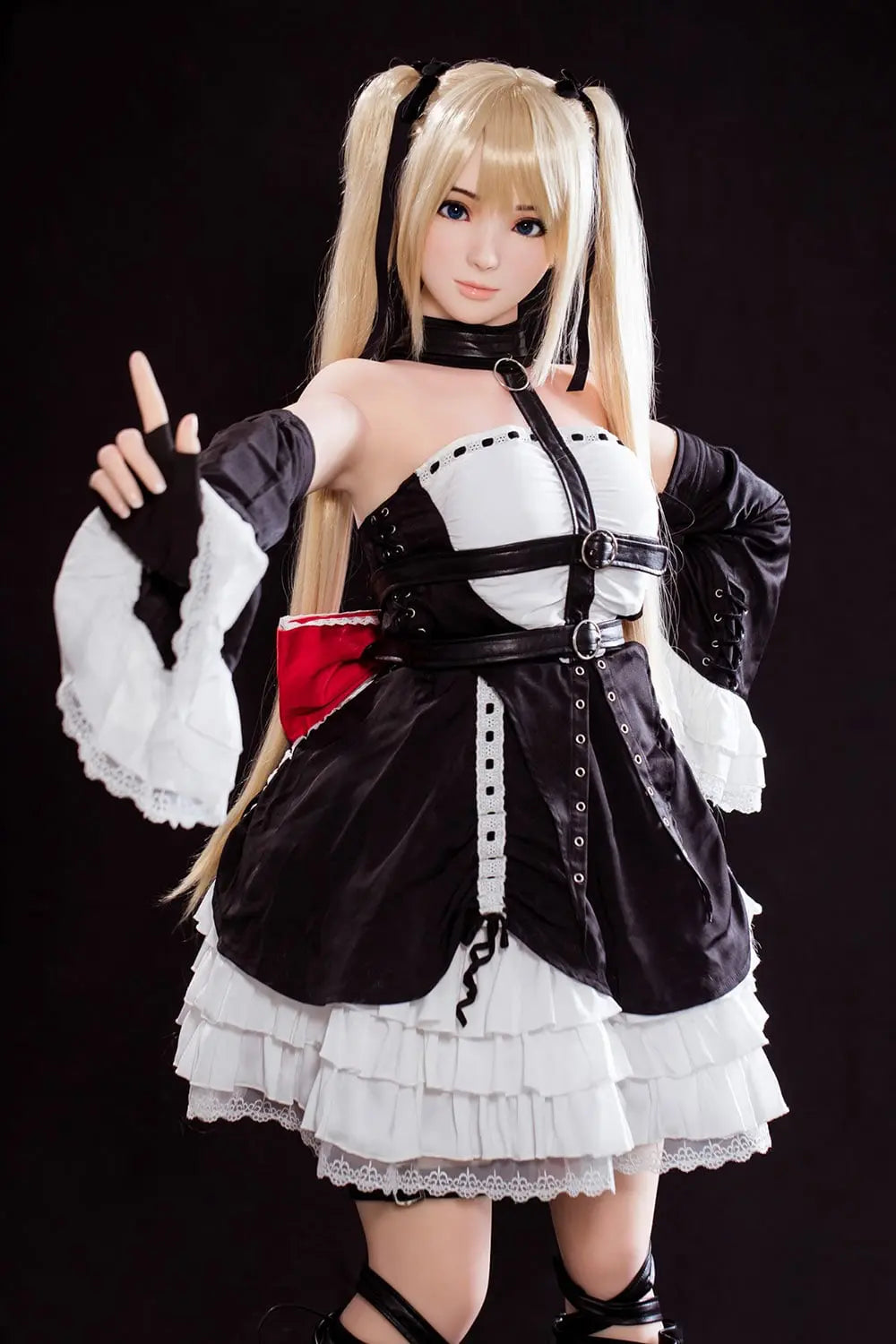 Alison blonde twin tails, black and white maid outfit, cosplay pose, dark background, standing and pointing her fingers up – Marie Rose cosplay sex doll by TopLoveDoll