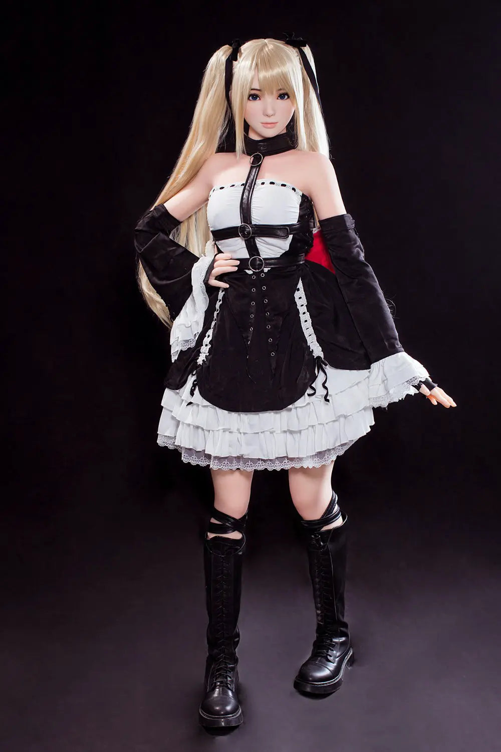 Alison blonde twin tails, black and white maid outfit, cosplay pose, dark background, standing and one hand at the waist – Marie Rose cosplay sex doll by TopLoveDoll