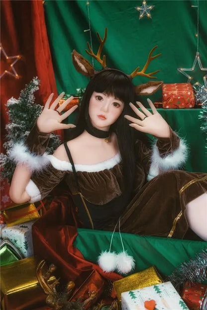 Amaris long black straight hair blunt bangs antler headband brown velvet top, Asian school goddess face Christmas red green background, cute asian girlfriend, sit among the gifts pile under Christmas tree – deer girl cosplay sex doll by TopLoveDoll