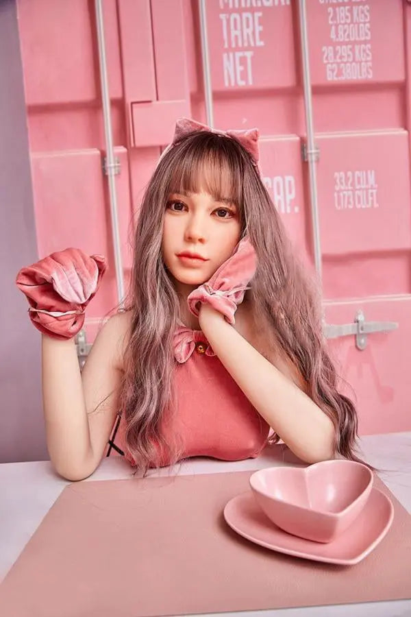 Amelia long wavy brown hair pink crop top pink mini skirt Y2K sweetgirl sitting in pink room soft Asian companion, sitting on a pink chair wearing pink lingerie set, sitting at the dinner table, everything is pinkie pinky, pink lifestyle– girl-next-door sex doll by TopLoveDoll