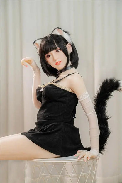 Amelie short black hair cat ears tail collar black bodysuit soft round face Asian catgirl full cosplay set, asian waifu catgirl cosplay, fun night for you, sitting and doing the meow gesture – anime companion sex doll by TopLoveDoll
