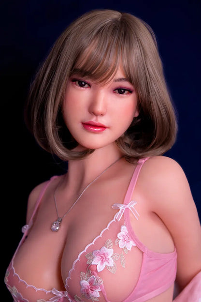 Antonella flaxen bob pear-cut J-style sweet girl in pink tracksuit and blush lace lingerie lounging on blue-white striped hammock with over-ear headphones, chest-level close up – curvy Asian sex doll by TopLoveDoll
