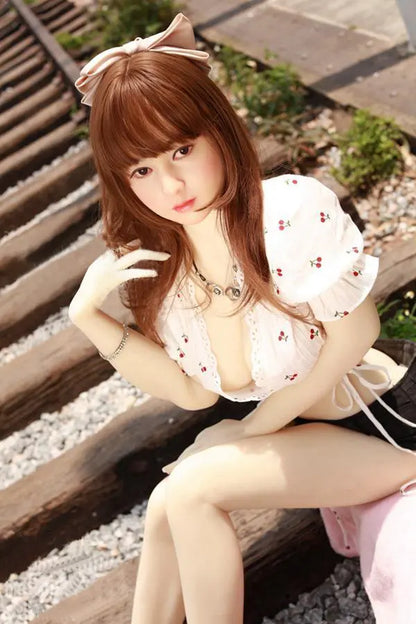 Arya high-maintenance Asian girlfriend sex doll- in cherry crop top and black denim shorts , sitting on the corridor- sweet face impossible energy the one you can't quit by TopLoveDoll