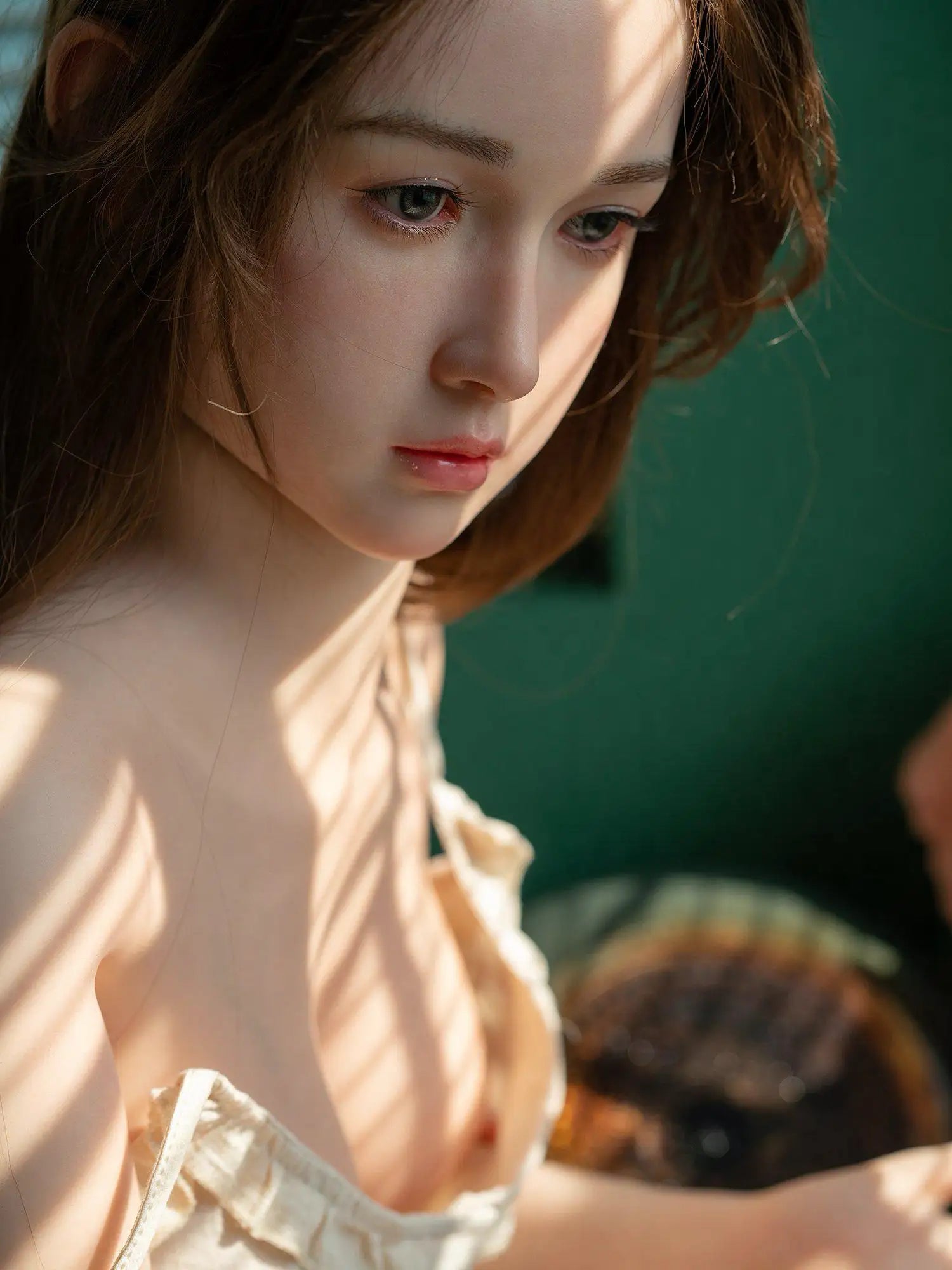 Ashlyn Eurasian goddess collector's edition sex doll, in a hue of warm sunshine, very feminine aura, side close up of face - perfect East-West harmony timeless beauty by TopLoveDoll