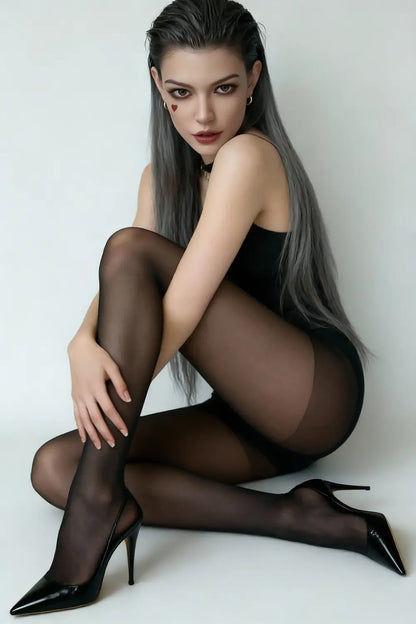 Premium dominant femdom sex doll Lieutenant in black sleeveless top and stockings - holding her leg with a seductive alpha woman stare - BDSM companion by TopLoveDoll